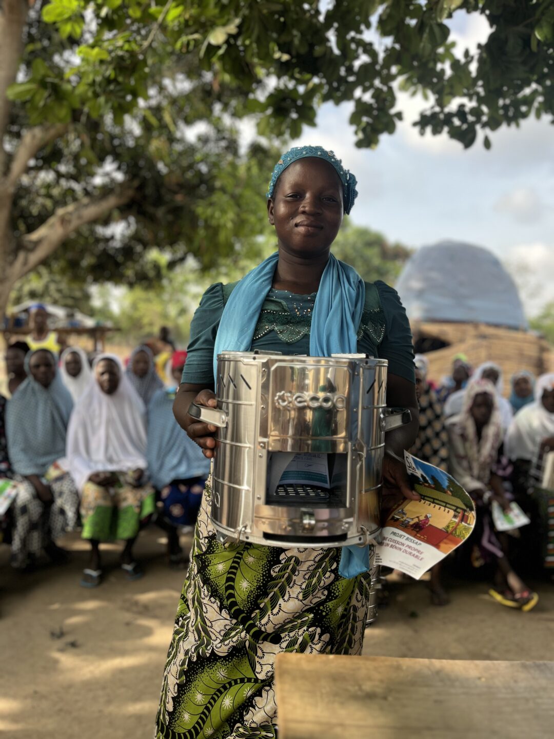 bissap woman cookstove smile scaled